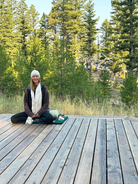 Jennifer French, E-RYT and owner of The Yoga Sanctuary enjoying the cool mountain air at Feathered Pipe Ranch Jennifer French, E-RYT and owner of The Yoga Sanctuary enjoying the cool mountain air at Feathered Pipe Ranch