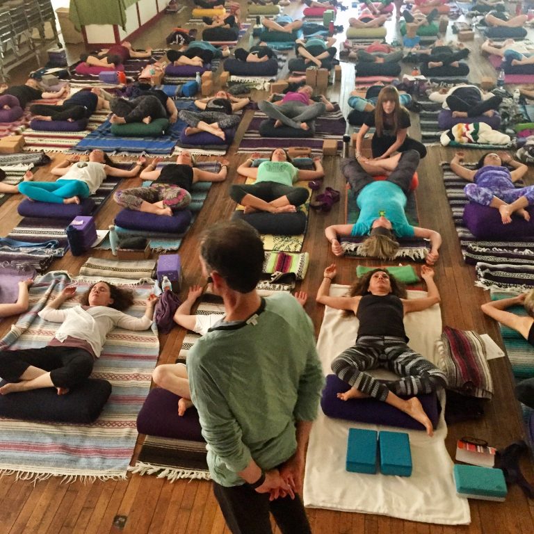 Tias Little leading a yoga class for The Yoga Sanctuary in Punta Gorda, Florida